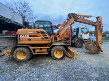 Gumikerekes kotró CASE