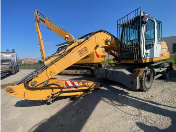 Gumikerekes kotró Liebherr A316Litronic: 2 kép.
