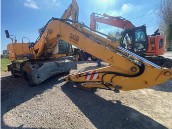 Gumikerekes kotró Liebherr A316Litronic: 3 kép.