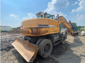 Gumikerekes kotró Liebherr A316Litronic: 5 kép.