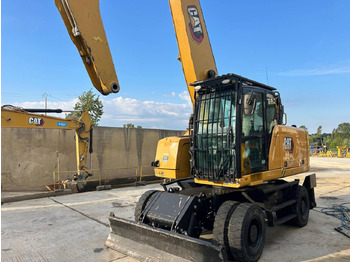 Gumikerekes kotró CATERPILLAR MH3024