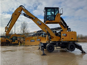 Gumikerekes kotró CATERPILLAR MH3024