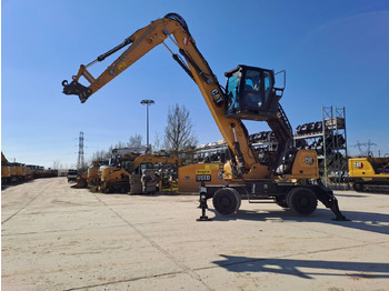 Gumikerekes kotró CATERPILLAR MH3024