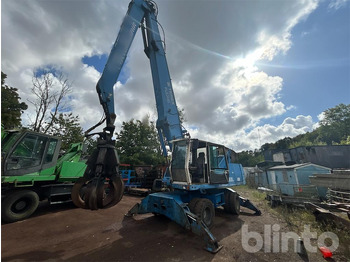 Hulladék kotró TEREX