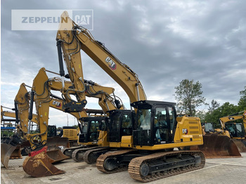 Lánctalpas kotró Cat 320-07D: 3 kép.