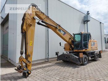Hulladék kotró CATERPILLAR MH3024