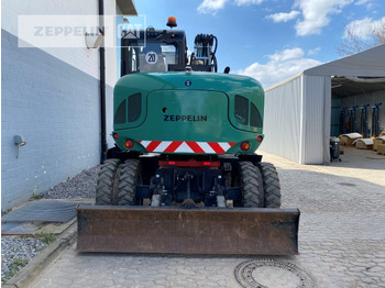 Gumikerekes kotró Zeppelin ZM110: 4 kép.