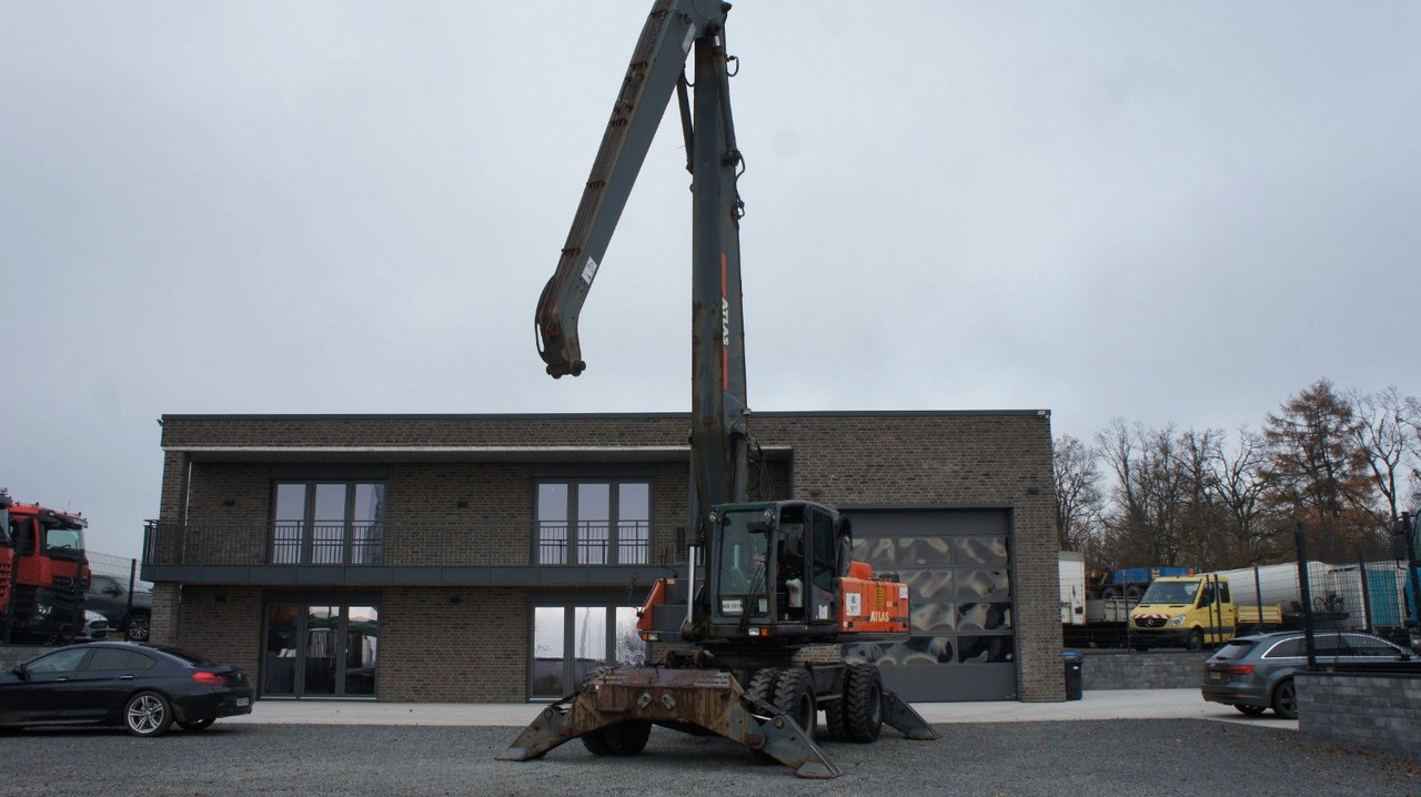 Atlas 350 MH Mobilbagger Umschlagbagger Pratzen - Gumikerekes kotró: 1 kép. Atlas 350 MH Mobilbagger Umschlagbagger Pratzen - Gumikerekes kotró: 1 kép.