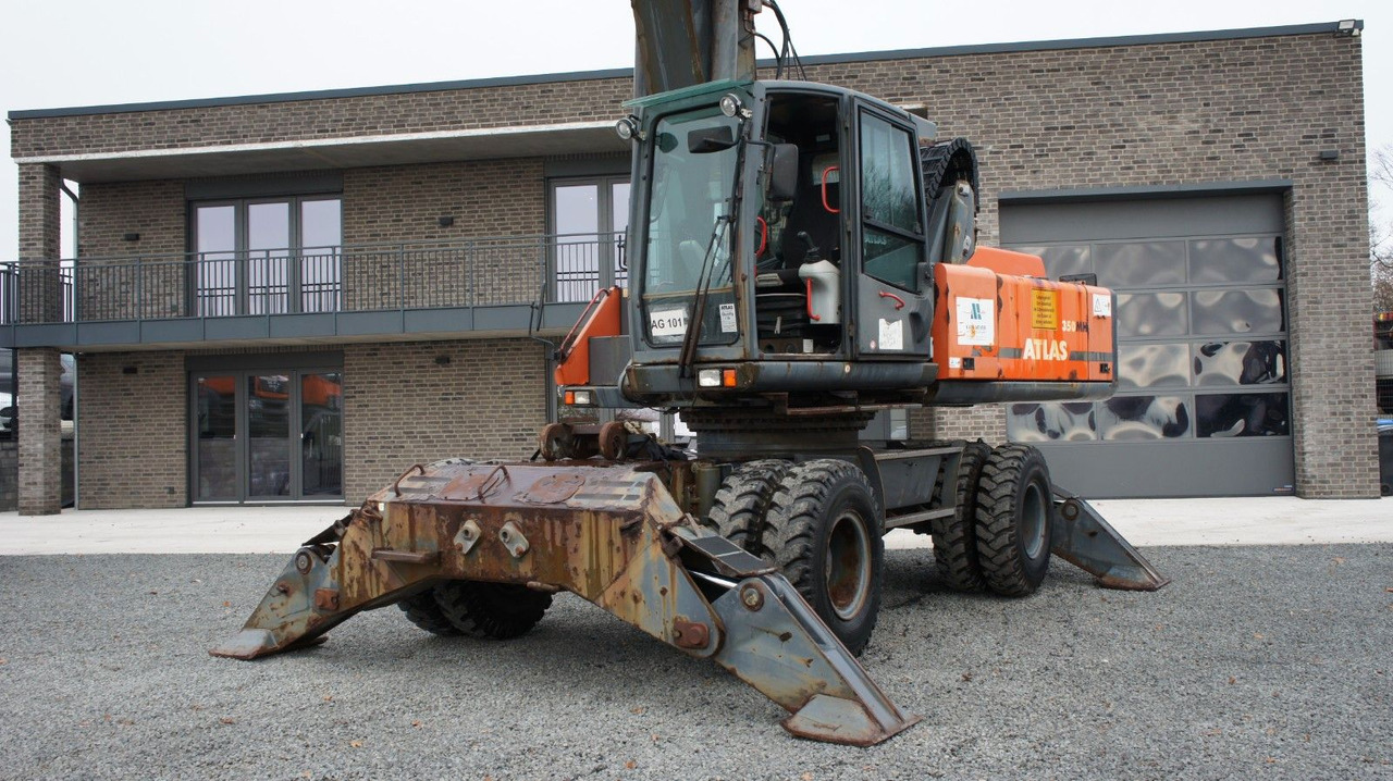 Atlas 350 MH Mobilbagger Umschlagbagger Pratzen - Gumikerekes kotró: 3 kép. Atlas 350 MH Mobilbagger Umschlagbagger Pratzen - Gumikerekes kotró: 3 kép.