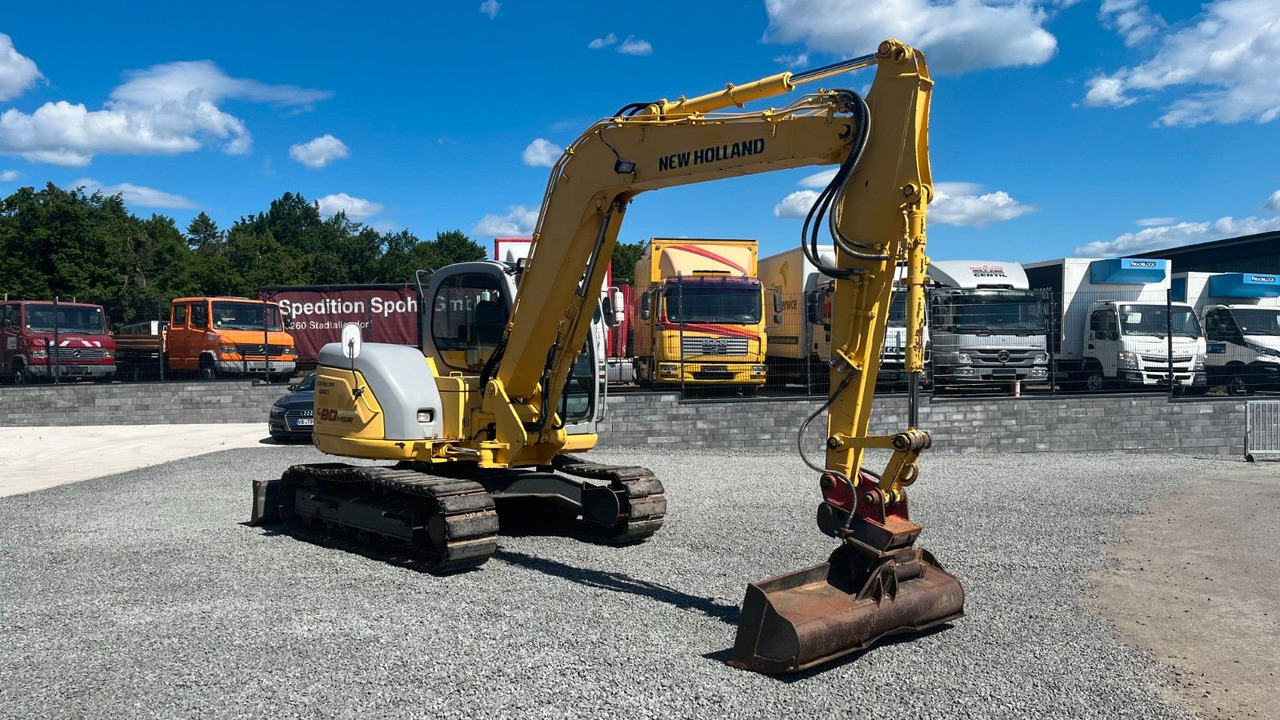 Kobelco New Holland E 80 MSR Minibagger SW 8300 Kg - Minikotró: 3 kép. Kobelco New Holland E 80 MSR Minibagger SW 8300 Kg - Minikotró: 3 kép.
