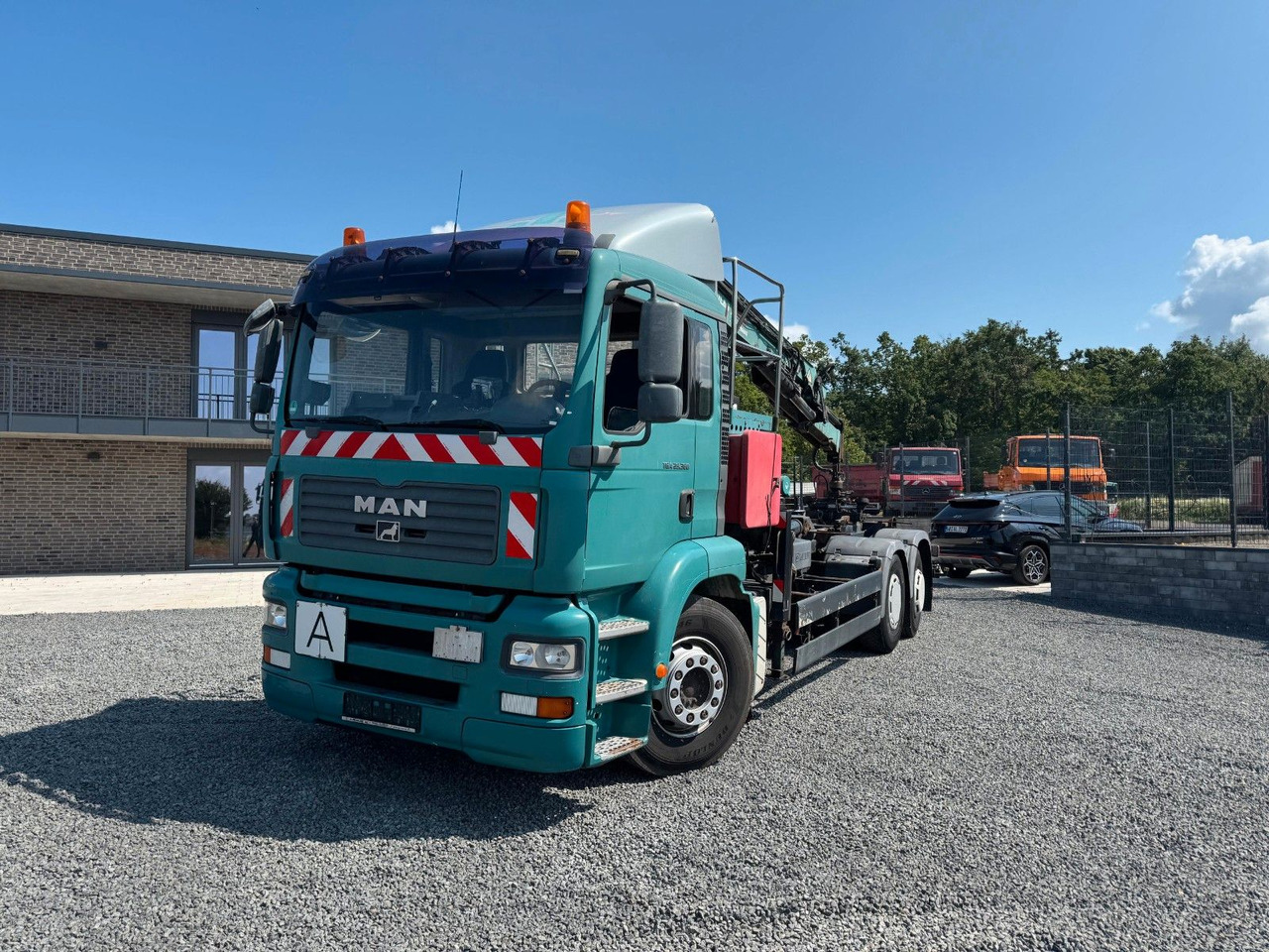 MAN TGA 26.360 Kran TeRex Multilift Fernbedienung - Horgos rakodó teherautó, Darus autó: 3 kép. MAN TGA 26.360 Kran TeRex Multilift Fernbedienung - Horgos rakodó teherautó, Darus autó: 3 kép.