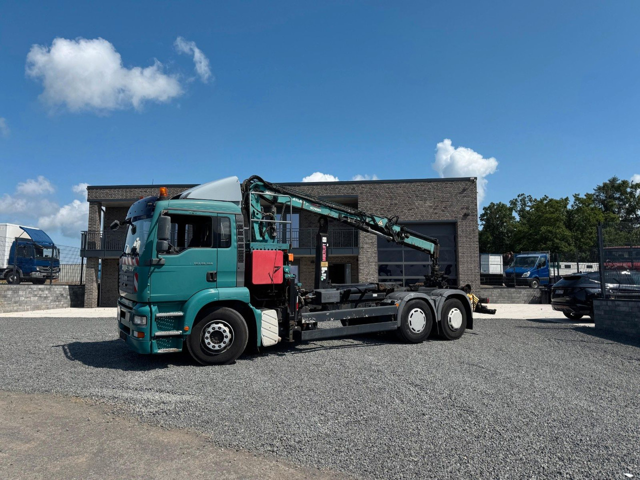 MAN TGA 26.360 Kran TeRex Multilift Fernbedienung - Horgos rakodó teherautó, Darus autó: 1 kép. MAN TGA 26.360 Kran TeRex Multilift Fernbedienung - Horgos rakodó teherautó, Darus autó: 1 kép.