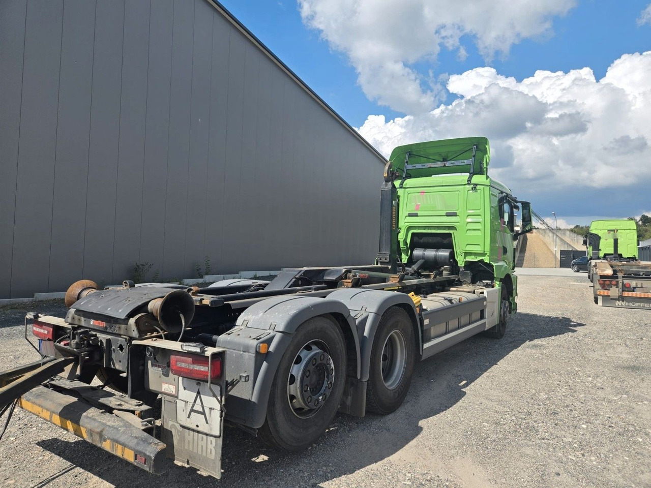 MAN TGS 2651 Abrollkipper HIAB Lift -Lenkachse - Horgos rakodó teherautó: 3 kép. MAN TGS 2651 Abrollkipper HIAB Lift -Lenkachse - Horgos rakodó teherautó: 3 kép.