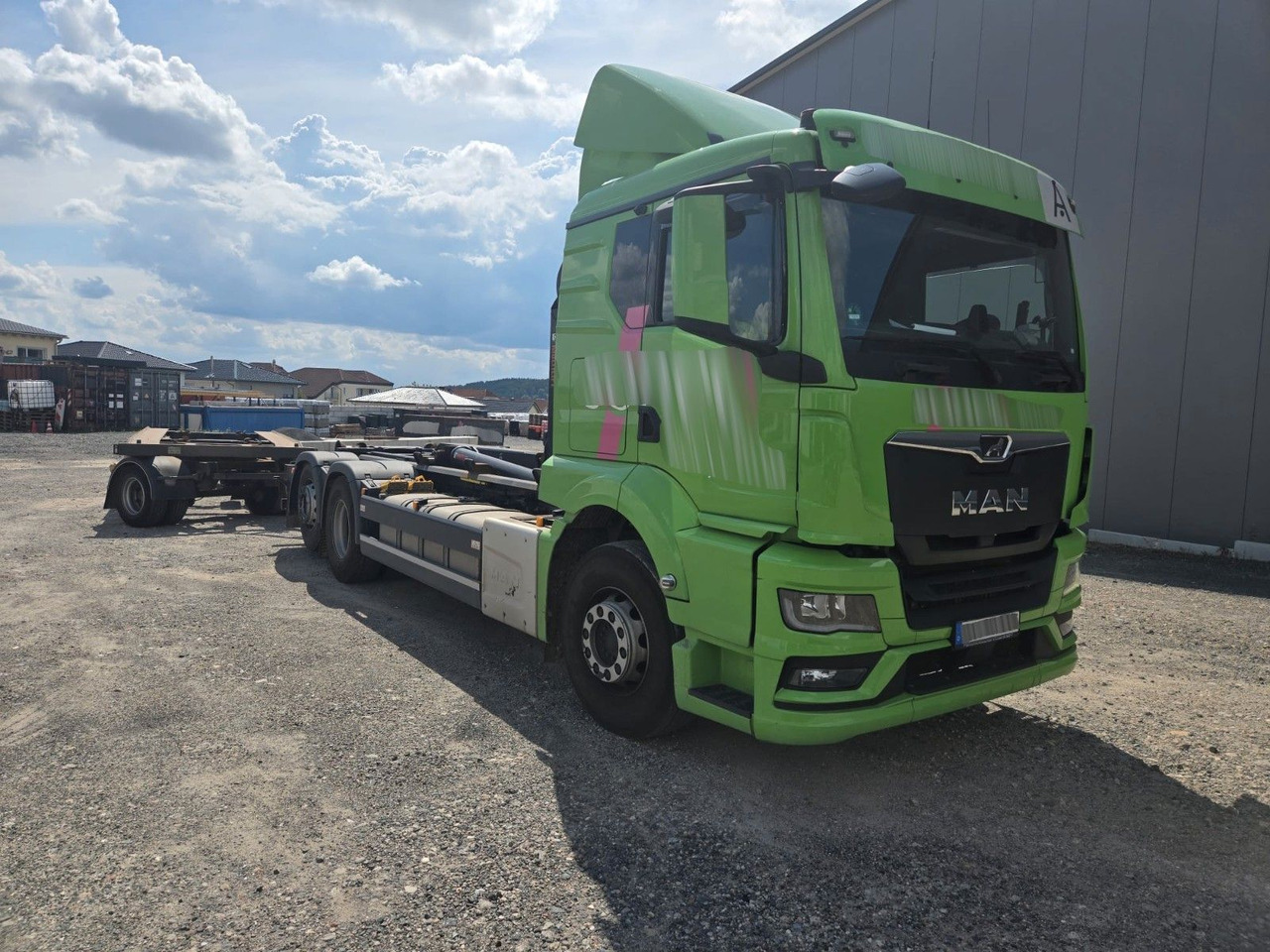 MAN TGS 2651 Abrollkipper HIAB Lift -Lenkachse - Horgos rakodó teherautó: 2 kép. MAN TGS 2651 Abrollkipper HIAB Lift -Lenkachse - Horgos rakodó teherautó: 2 kép.