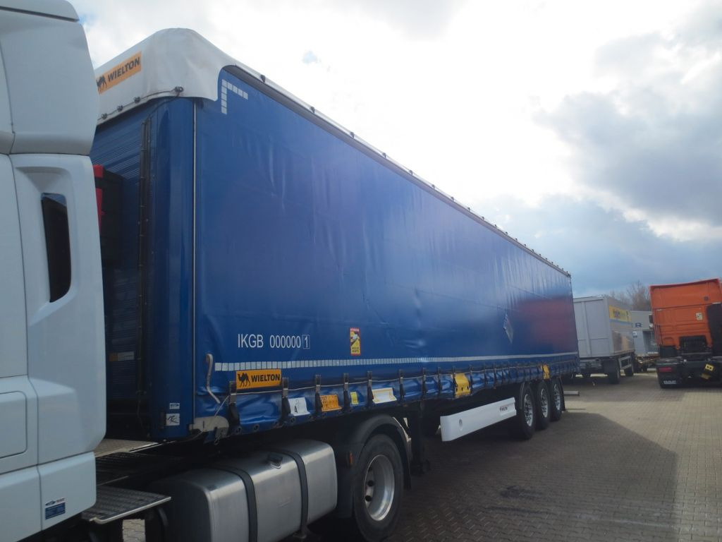 Wielton Curtain Master Stand. BAHNVERLADEFÄHIG Code P386 Wielton Curtain Master Stand. BAHNVERLADEFÄHIG Code P386 - Ponyvás félpótkocsi: 5 kép. Wielton Curtain Master Stand. BAHNVERLADEFÄHIG Code P386 Wielton Curtain Master Stand. BAHNVERLADEFÄHIG Code P386 - Ponyvás félpótkocsi: 5 kép.