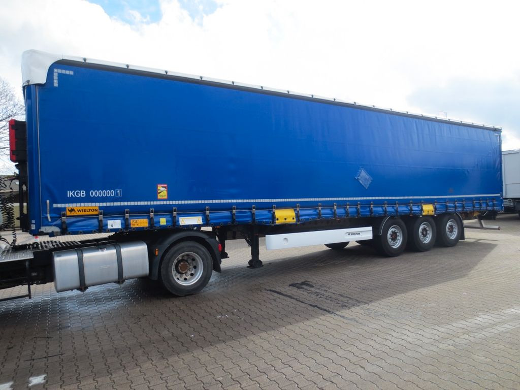 Wielton Curtain Master Stand. BAHNVERLADEFÄHIG Code P386 Wielton Curtain Master Stand. BAHNVERLADEFÄHIG Code P386 - Ponyvás félpótkocsi: 2 kép. Wielton Curtain Master Stand. BAHNVERLADEFÄHIG Code P386 Wielton Curtain Master Stand. BAHNVERLADEFÄHIG Code P386 - Ponyvás félpótkocsi: 2 kép.