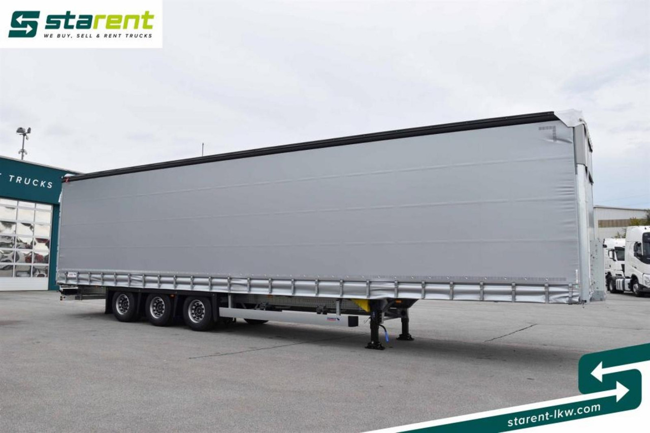 Schmitz Megatrailer Hubdach Liftachse D.C. 9.5-Zertifikat - Ponyvás félpótkocsi: 3 kép. Schmitz Megatrailer Hubdach Liftachse D.C. 9.5-Zertifikat - Ponyvás félpótkocsi: 3 kép.