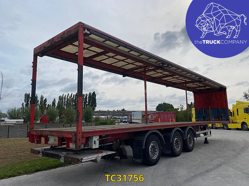 LAG - Platós félpótkocsi: 4 kép. LAG - Platós félpótkocsi: 4 kép.