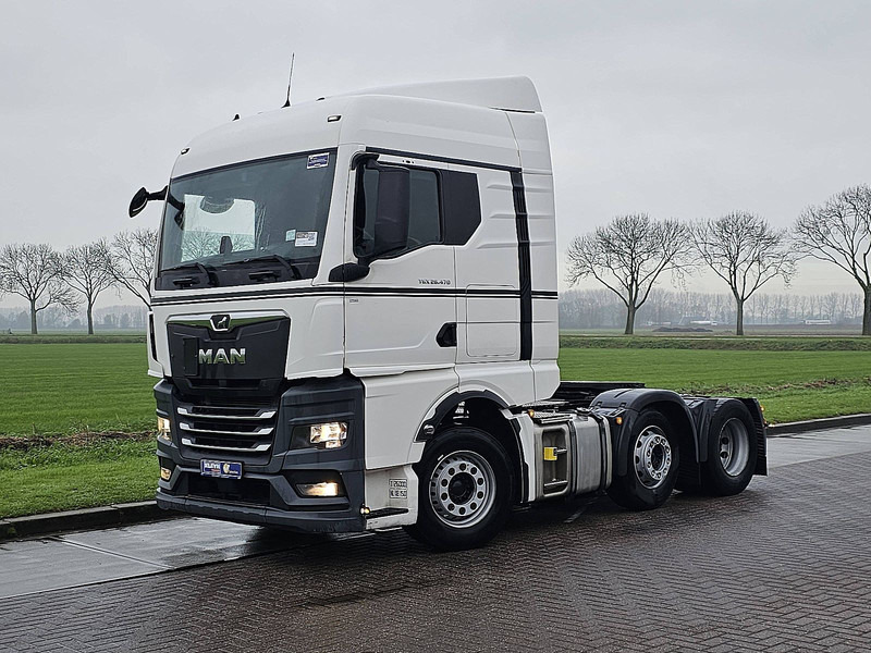 MAN 26.470 TGX TG3 GM 6X2/2 BL - Nyergesvontató: 2 kép. MAN 26.470 TGX TG3 GM 6X2/2 BL - Nyergesvontató: 2 kép.