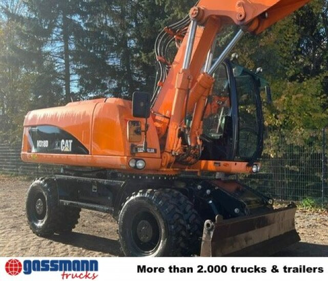CAT M318D Mobilbagger - Építőipari gépek: 5 kép. CAT M318D Mobilbagger - Építőipari gépek: 5 kép.