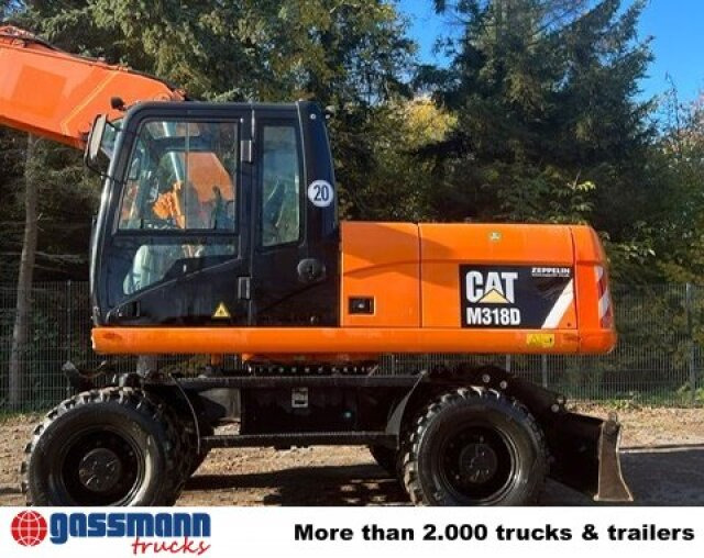 CAT M318D Mobilbagger - Építőipari gépek: 3 kép. CAT M318D Mobilbagger - Építőipari gépek: 3 kép.