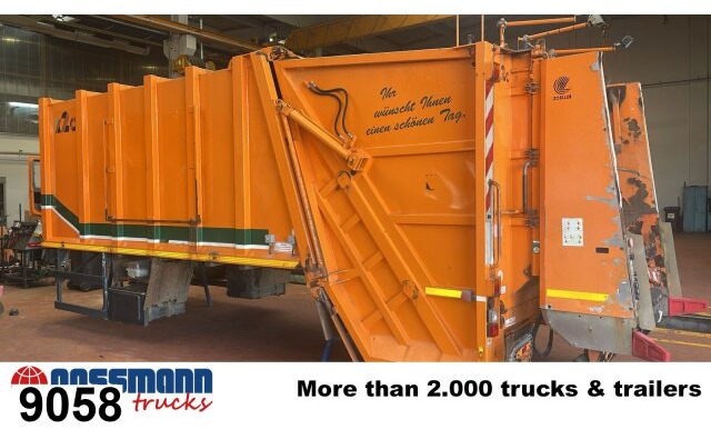 M21X2C mit Zöller Schüttung - Horgos rakodó teherautó: 1 kép. M21X2C mit Zöller Schüttung - Horgos rakodó teherautó: 1 kép.