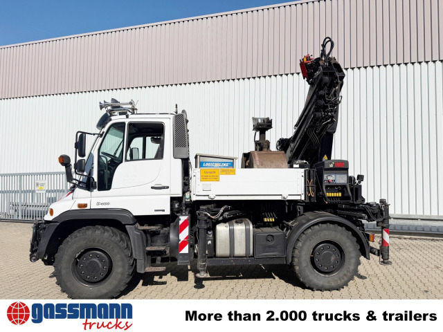 Unimog U400 4x4, Frontzapfwelle, Heckkran Hiab XS - Platós teherautó, Darus autó: 4 kép. Unimog U400 4x4, Frontzapfwelle, Heckkran Hiab XS - Platós teherautó, Darus autó: 4 kép.