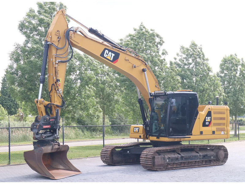 Caterpillar 323 07A | ROTOTILT | GPS NOVATRON | OILQUICK | FULL OPTION - Lánctalpas kotró: 2 kép. Caterpillar 323 07A | ROTOTILT | GPS NOVATRON | OILQUICK | FULL OPTION - Lánctalpas kotró: 2 kép.