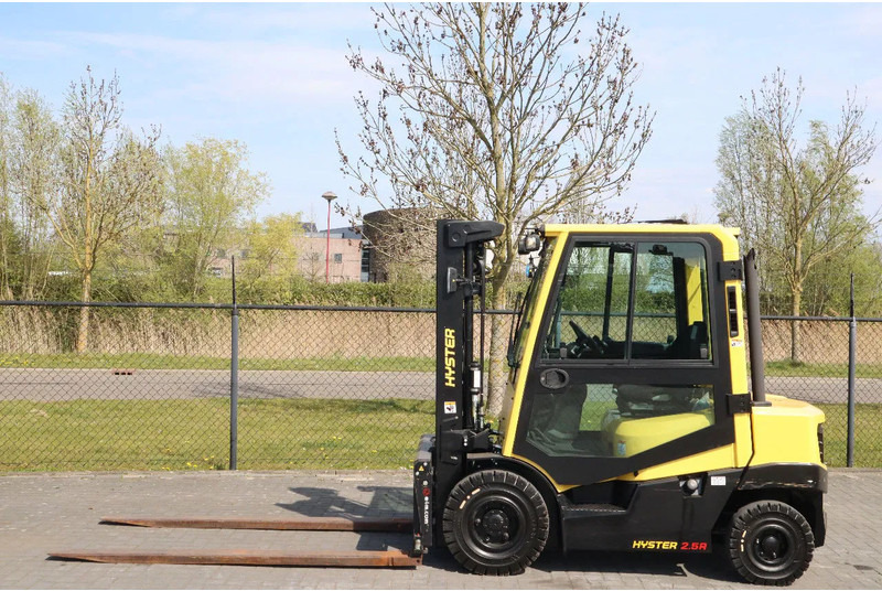 Hyster H2.5 A | BOOM SUSPENSION | SIDESHIFT | FORK EXTENTIONS | FORK POSITIONERS - Dízel targonca: 1 kép. Hyster H2.5 A | BOOM SUSPENSION | SIDESHIFT | FORK EXTENTIONS | FORK POSITIONERS - Dízel targonca: 1 kép.