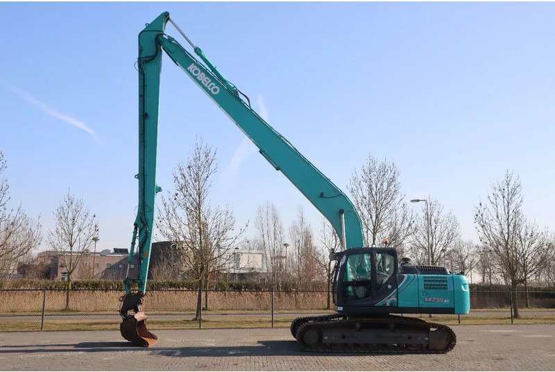 Kobelco SK260 NLC -10E | 18.5 METER LONG REACH | TILT BUCKET - Lánctalpas kotró: 1 kép. Kobelco SK260 NLC -10E | 18.5 METER LONG REACH | TILT BUCKET - Lánctalpas kotró: 1 kép.