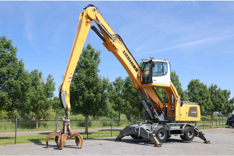 Liebherr LH 40 M LITRONIC | GRAB | QUICK COUPLER | 16 METER - Gumikerekes kotró: 2 kép. Liebherr LH 40 M LITRONIC | GRAB | QUICK COUPLER | 16 METER - Gumikerekes kotró: 2 kép.