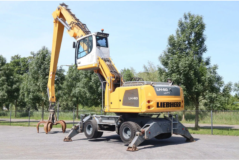 Liebherr LH 40 M LITRONIC | GRAB | QUICK COUPLER | 16 METER - Gumikerekes kotró: 3 kép. Liebherr LH 40 M LITRONIC | GRAB | QUICK COUPLER | 16 METER - Gumikerekes kotró: 3 kép.