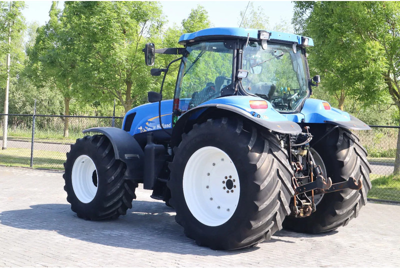 New Holland TS135A | 40 KM/H | 4X4 | SUPERSTEER - Traktor: 3 kép. New Holland TS135A | 40 KM/H | 4X4 | SUPERSTEER - Traktor: 3 kép.