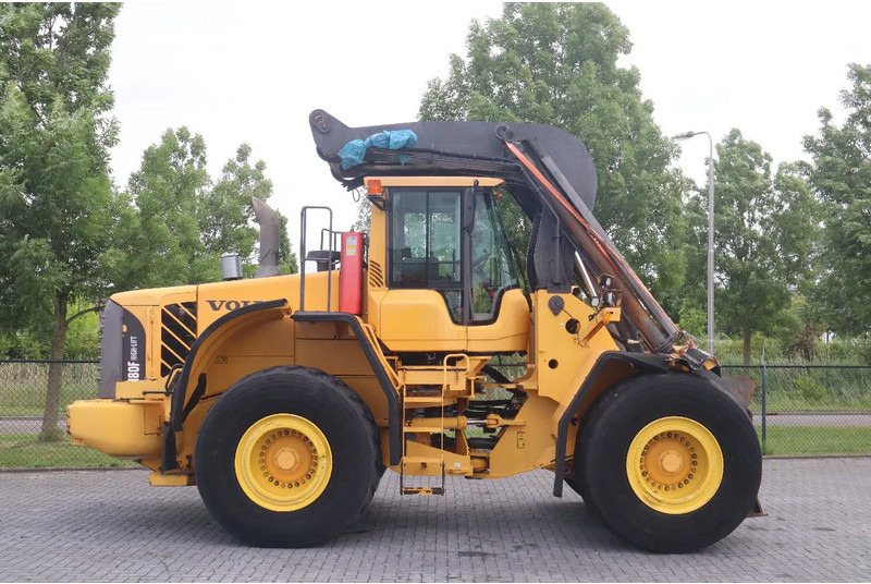 Volvo L180 F HL | HIGH-LIFT | LOG STACKER | HOLZ GRAPPLE - Gumikerekes homlokrakodó: 4 kép. Volvo L180 F HL | HIGH-LIFT | LOG STACKER | HOLZ GRAPPLE - Gumikerekes homlokrakodó: 4 kép.