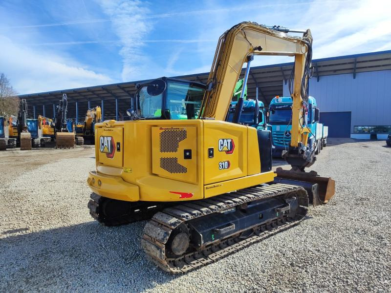 Caterpillar 310-07A - Lánctalpas kotró: 4 kép. Caterpillar 310-07A - Lánctalpas kotró: 4 kép.