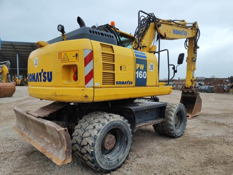 Komatsu PW160-8 - Gumikerekes kotró: 4 kép. Komatsu PW160-8 - Gumikerekes kotró: 4 kép.