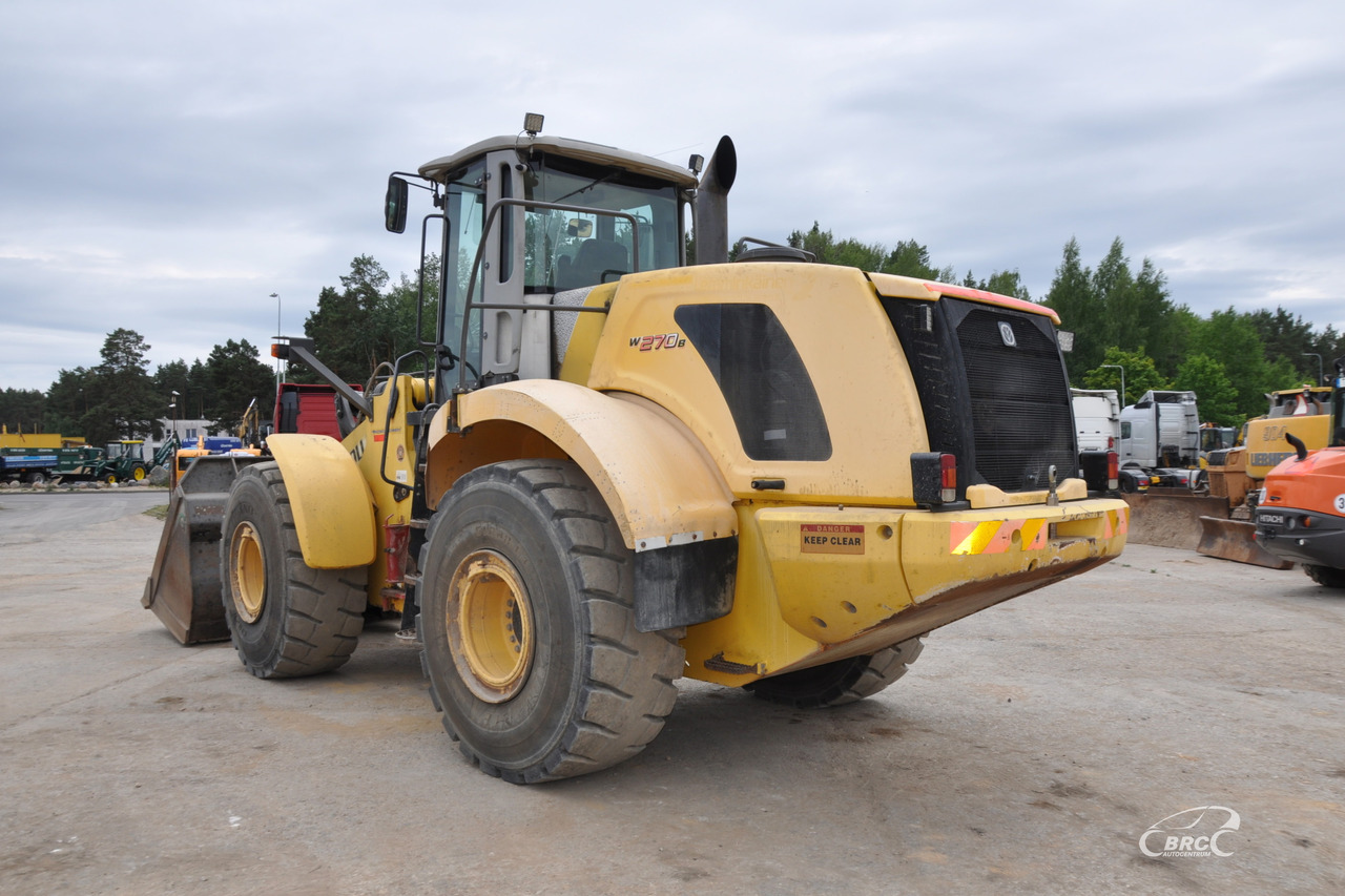 New Holland W270B - Gumikerekes homlokrakodó: 4 kép. New Holland W270B - Gumikerekes homlokrakodó: 4 kép.