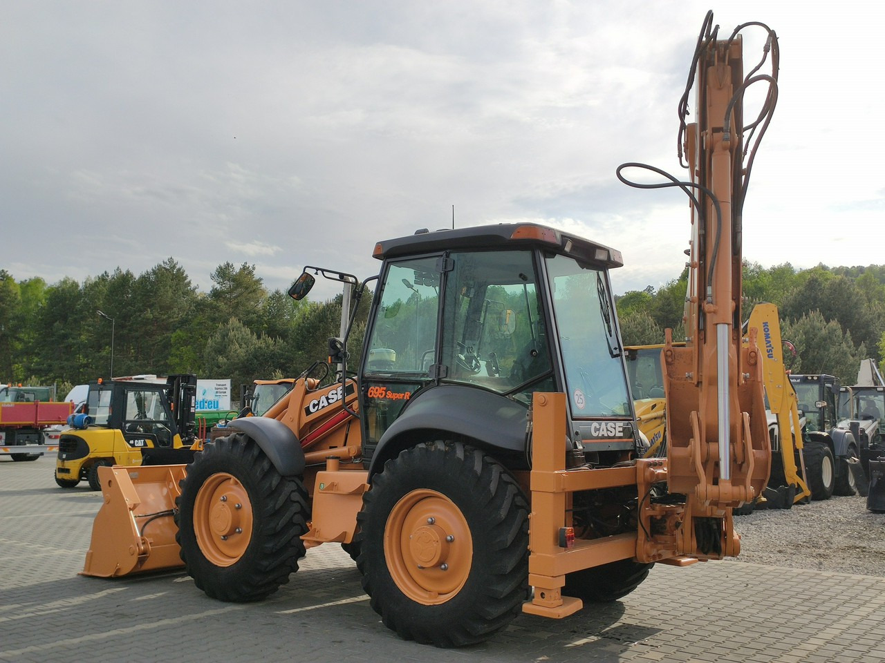 Kotrórakodó Case 695SR2-4PS: 11 kép. Kotrórakodó Case 695SR2-4PS: 11 kép.