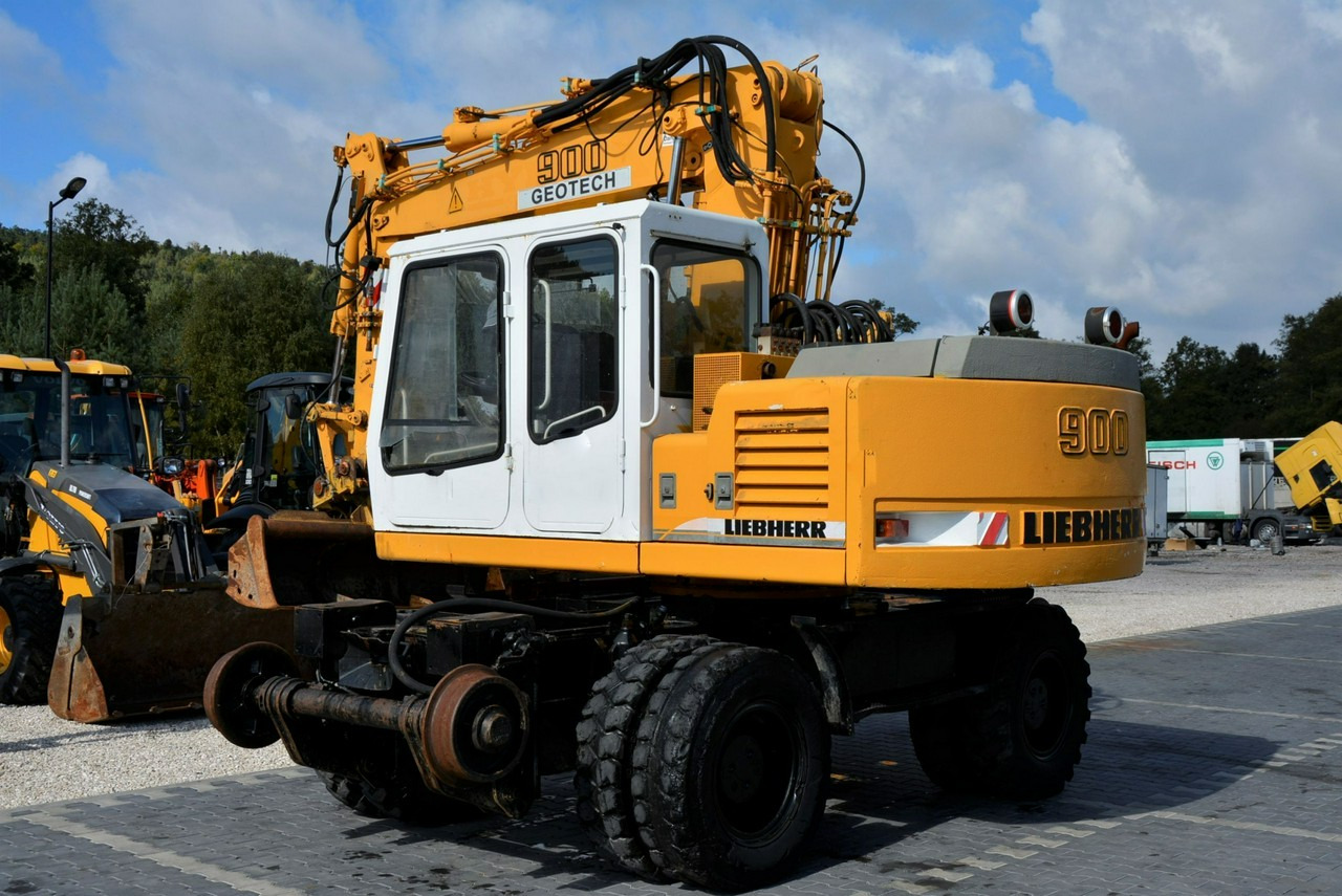 Liebherr A 900 ZW Litronic Koparka + Kolej - Gumikerekes kotró: 5 kép. Liebherr A 900 ZW Litronic Koparka + Kolej - Gumikerekes kotró: 5 kép.