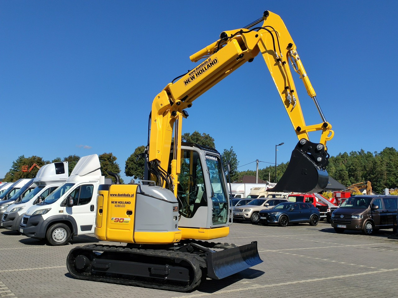 New Holland E90B SR -2 Gąsienicowa 10ton - Minikotró: 2 kép. New Holland E90B SR -2 Gąsienicowa 10ton - Minikotró: 2 kép.