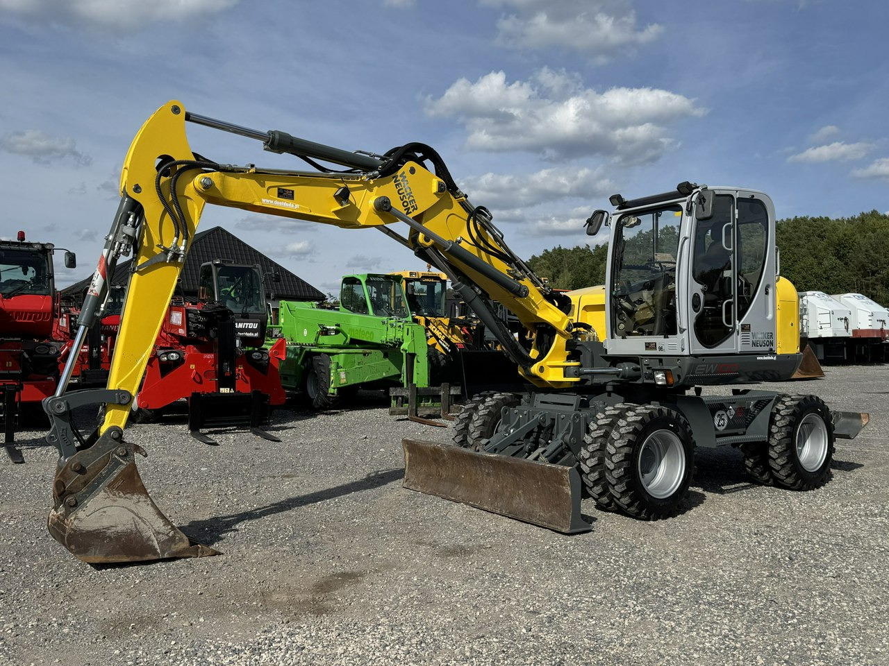 Wacker Neuson EW100 Pług + Podpory 10 ton Szybkozłącze Klimatyzacja - Gumikerekes kotró: 4 kép. Wacker Neuson EW100 Pług + Podpory 10 ton Szybkozłącze Klimatyzacja - Gumikerekes kotró: 4 kép.