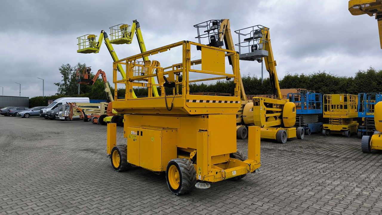GENIE GS 4069 DC - Ollós emelő: 1 kép. GENIE GS 4069 DC - Ollós emelő: 1 kép.