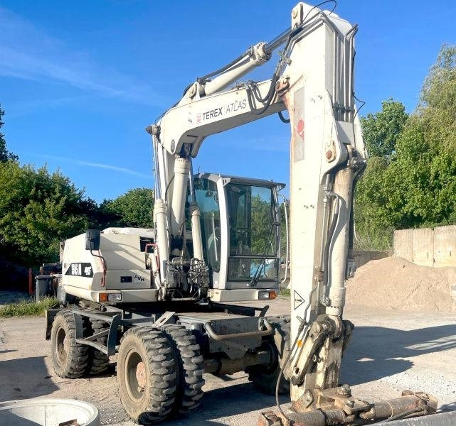 Atlas 1505 - Gumikerekes kotró: 3 kép. Atlas 1505 - Gumikerekes kotró: 3 kép.