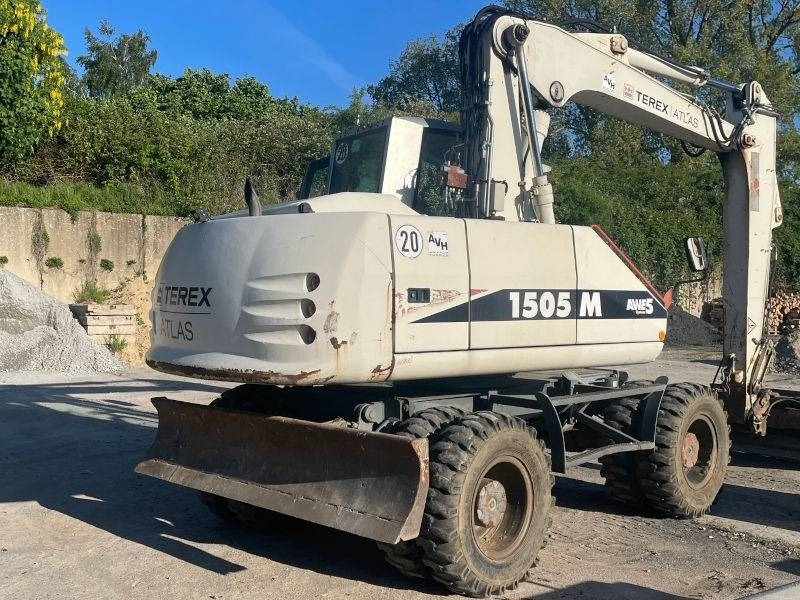 Atlas 1505 - Gumikerekes kotró: 4 kép. Atlas 1505 - Gumikerekes kotró: 4 kép.