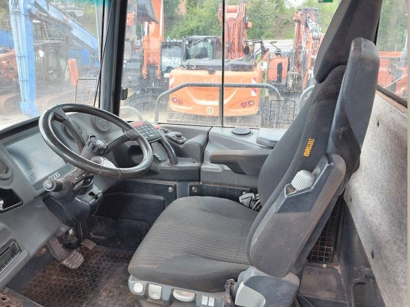 Csuklós dömper Bell B 45 E: 8 kép. Csuklós dömper Bell B 45 E: 8 kép.