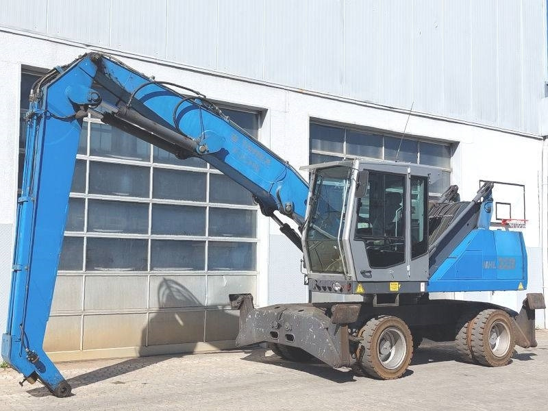 Fuchs MHL 320 D - Hulladék kotró: 2 kép. Fuchs MHL 320 D - Hulladék kotró: 2 kép.