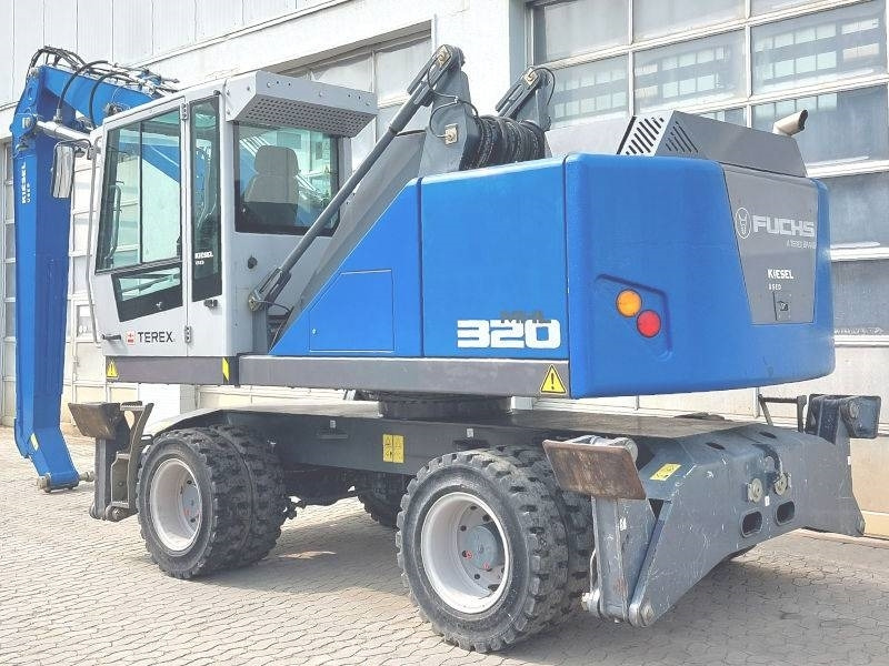 Fuchs MHL 320 F - Hulladék kotró: 3 kép. Fuchs MHL 320 F - Hulladék kotró: 3 kép.