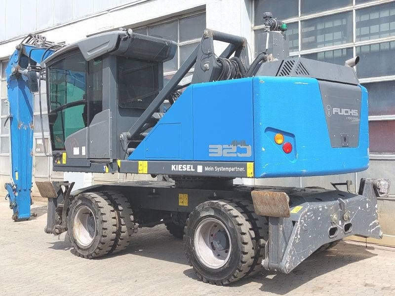 Fuchs MHL 320 F - Hulladék kotró: 3 kép. Fuchs MHL 320 F - Hulladék kotró: 3 kép.