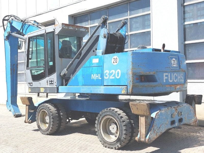 Fuchs MHL 320 - Hulladék kotró: 3 kép. Fuchs MHL 320 - Hulladék kotró: 3 kép.