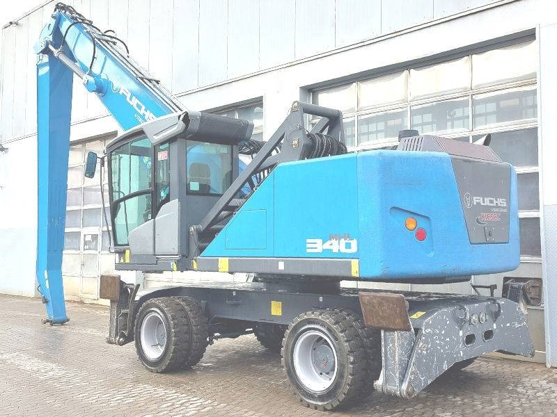 Fuchs MHL 340 F - Hulladék kotró: 3 kép. Fuchs MHL 340 F - Hulladék kotró: 3 kép.